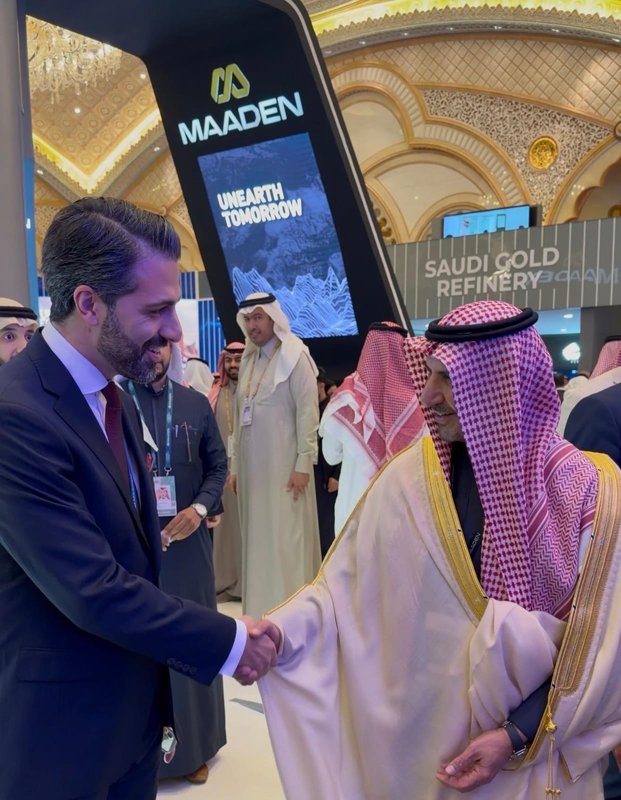 MaadenX representative greeting Khalid Al Mudaifer at the MAADEN exhibition booth